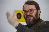 Wulf Herzogenrath während des Vortrages Über die Arbeit des Videokünstlers Peter Campus, bildo Studio I, 1992. Foto: Thomas Kemnitz  